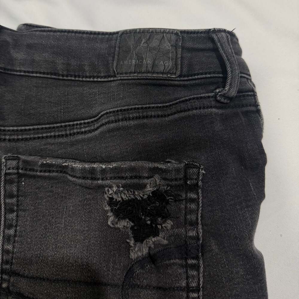 American Eagle Super Hi-Rise Next Level Stretch Black Distressed Button-Fly Shor - Picture 4 of 7